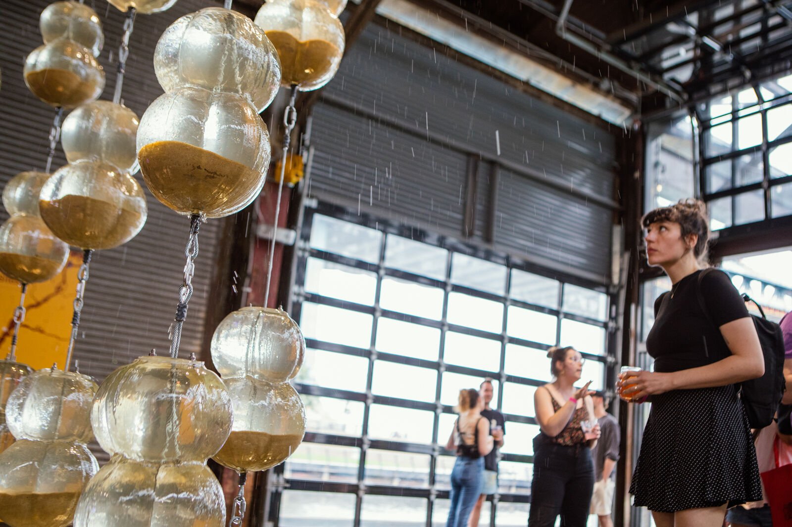 Guests inside Cherry Street Pier during Freshwater's opening reception