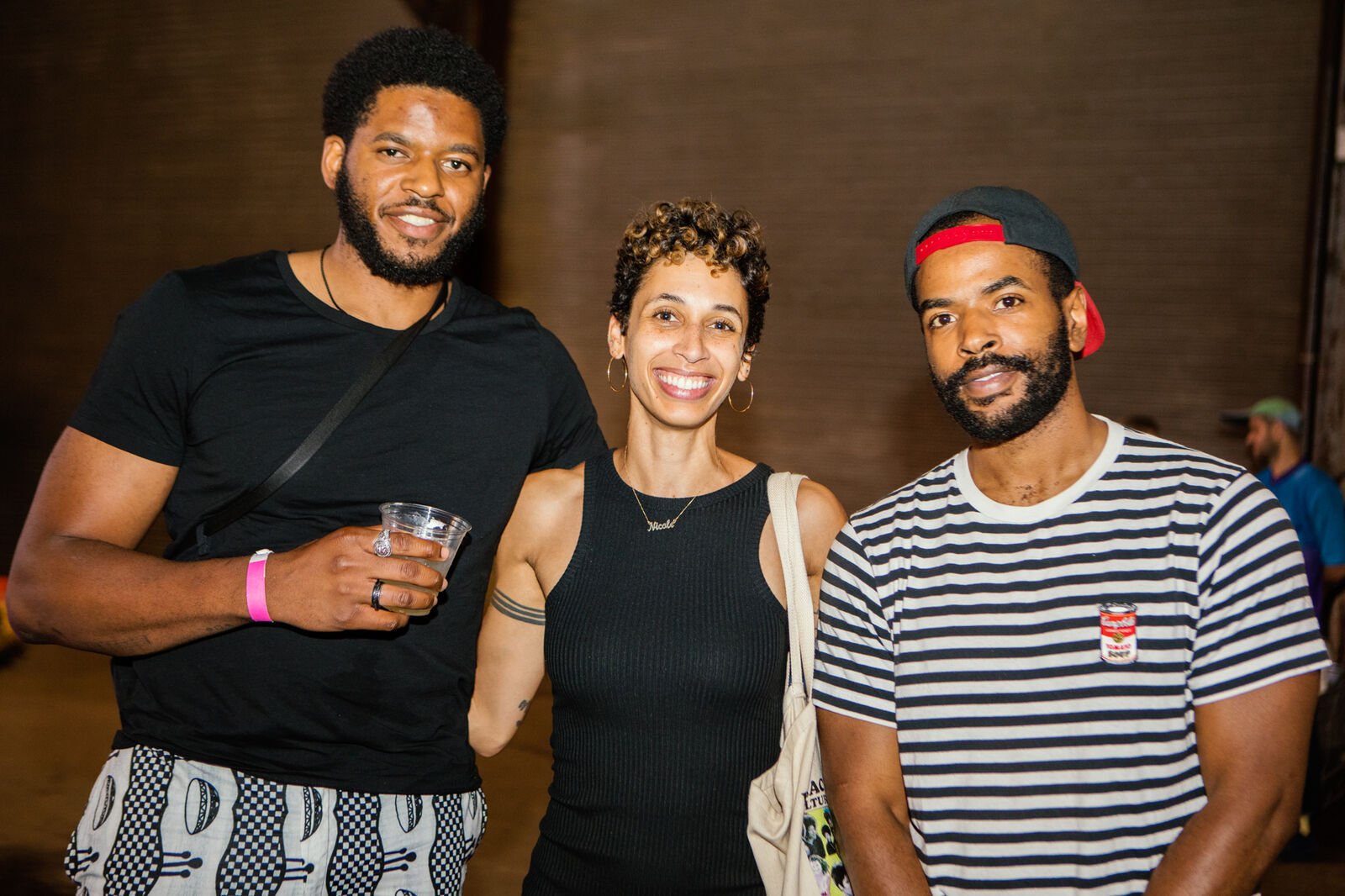 Three guests during the opening reception. In the center, PC's Curator of Lived Culture, Nicole Pollard
